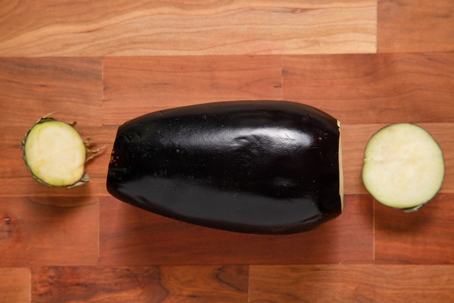 Globe Eggplant With Its Ends Cut for Roasted Eggplant Recipe