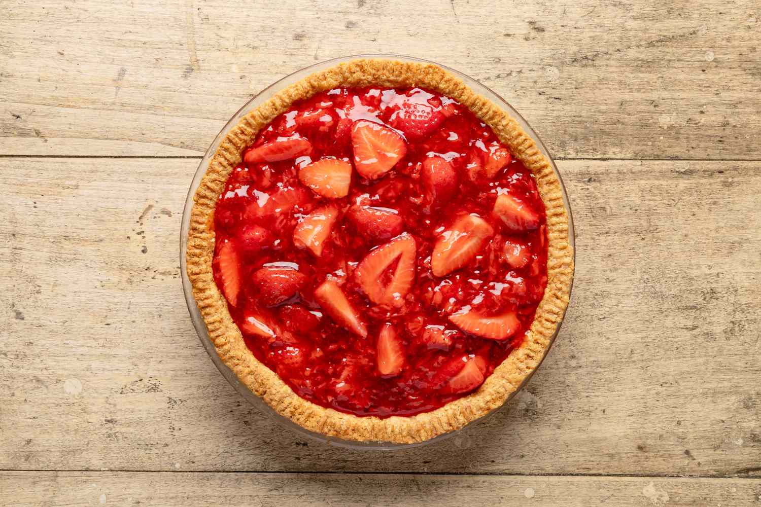 strawberry filling added to a baked pie crust for fresh strawberry pie recipe