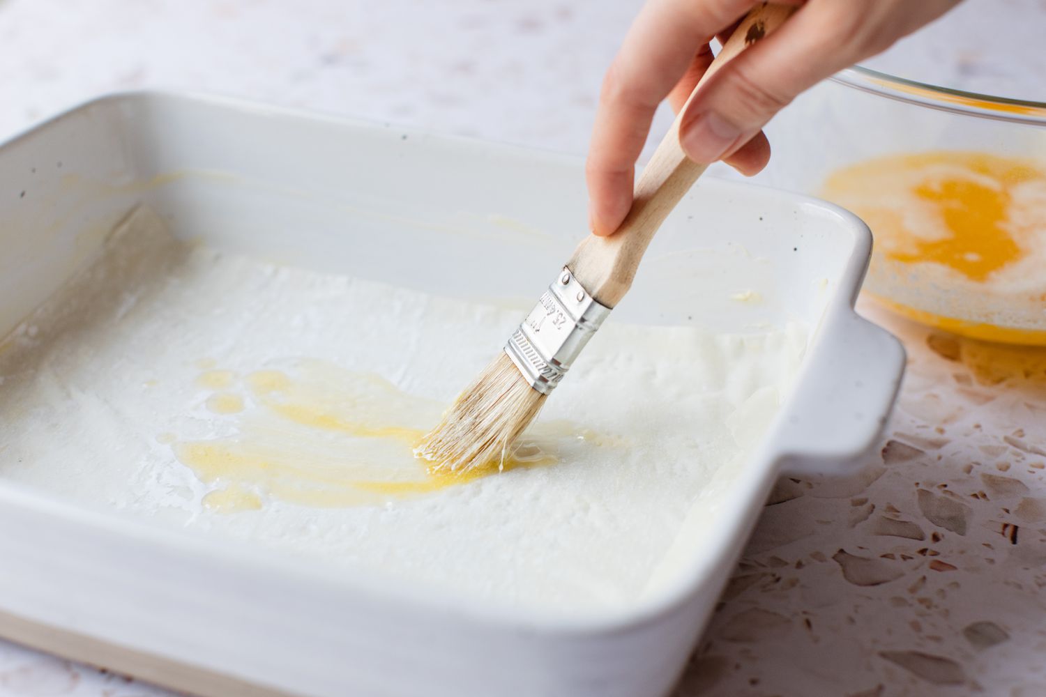 One Slice of Phyllo Dough in a Casserole Dish Brushed with Melted Butter