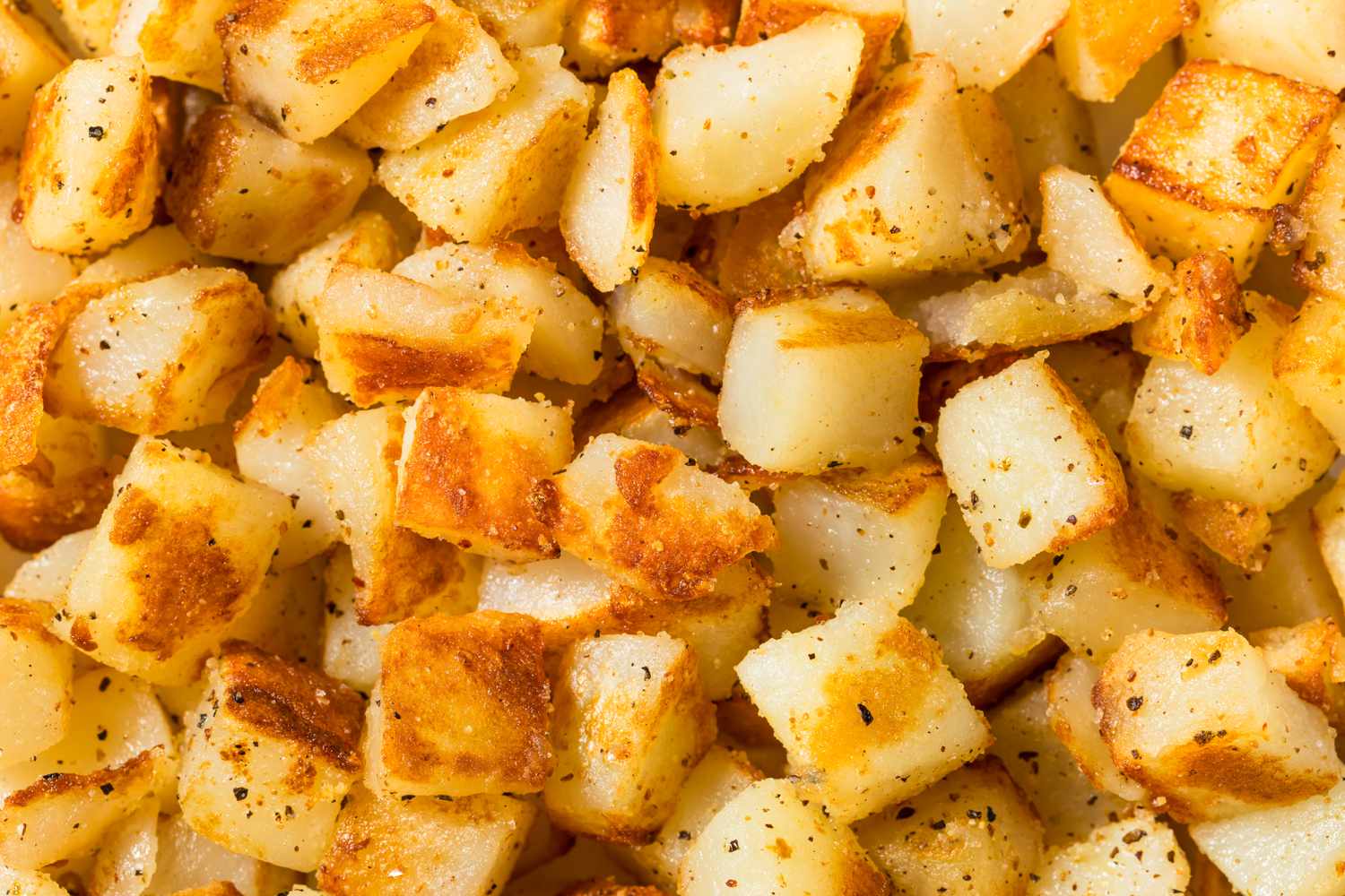 Homemade Fried Potato Hash Browns with Salt and Pepper
