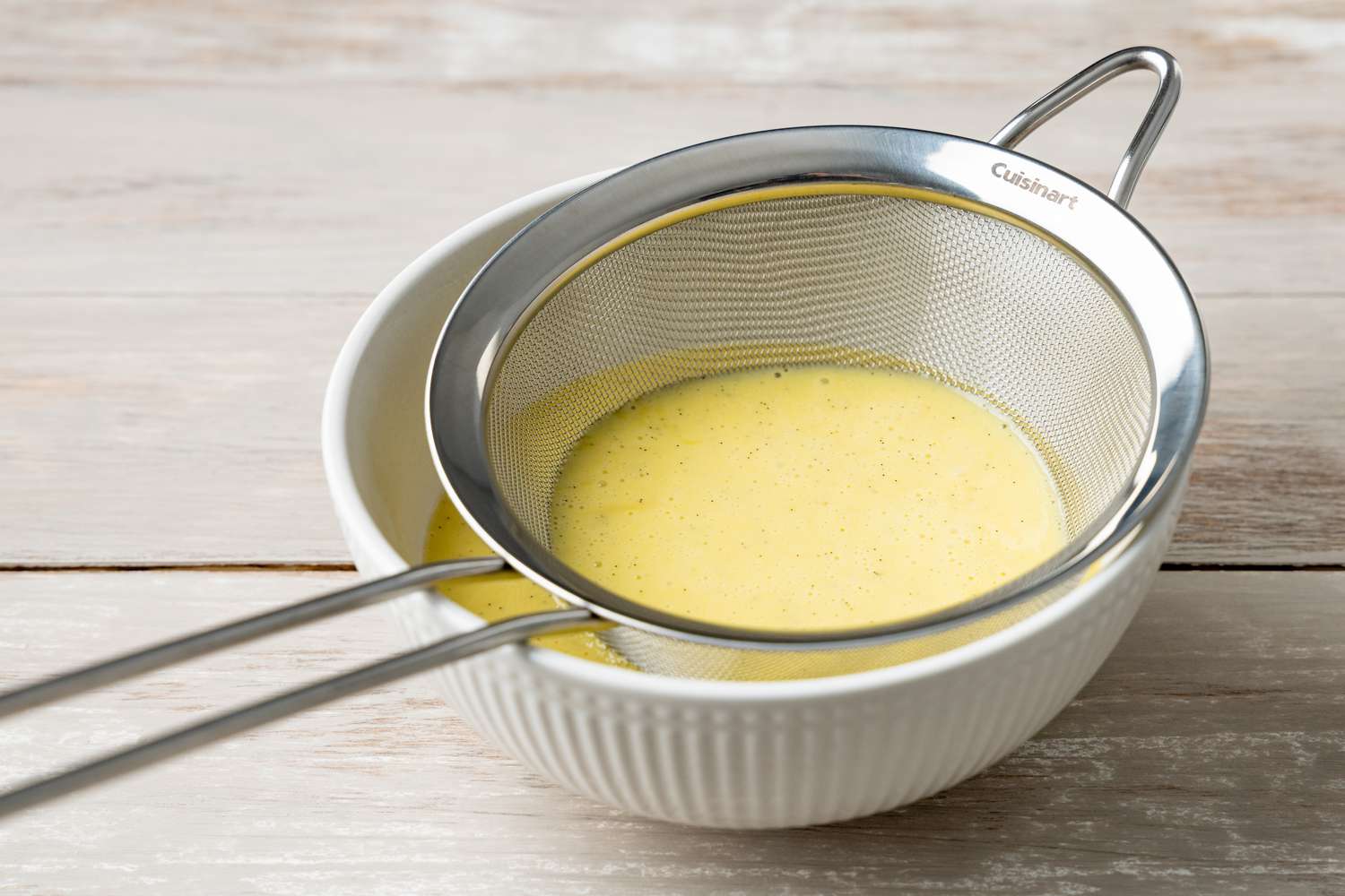 Creme Anglaise through a Sieve