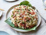 Vietnamese steamed rice served over banana leaves.