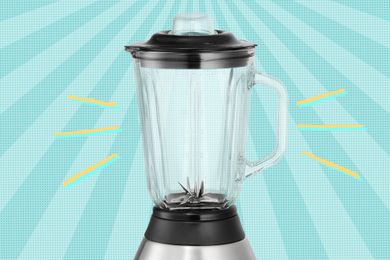 A countertop blender with a glass jar displayed against a radial gradient background