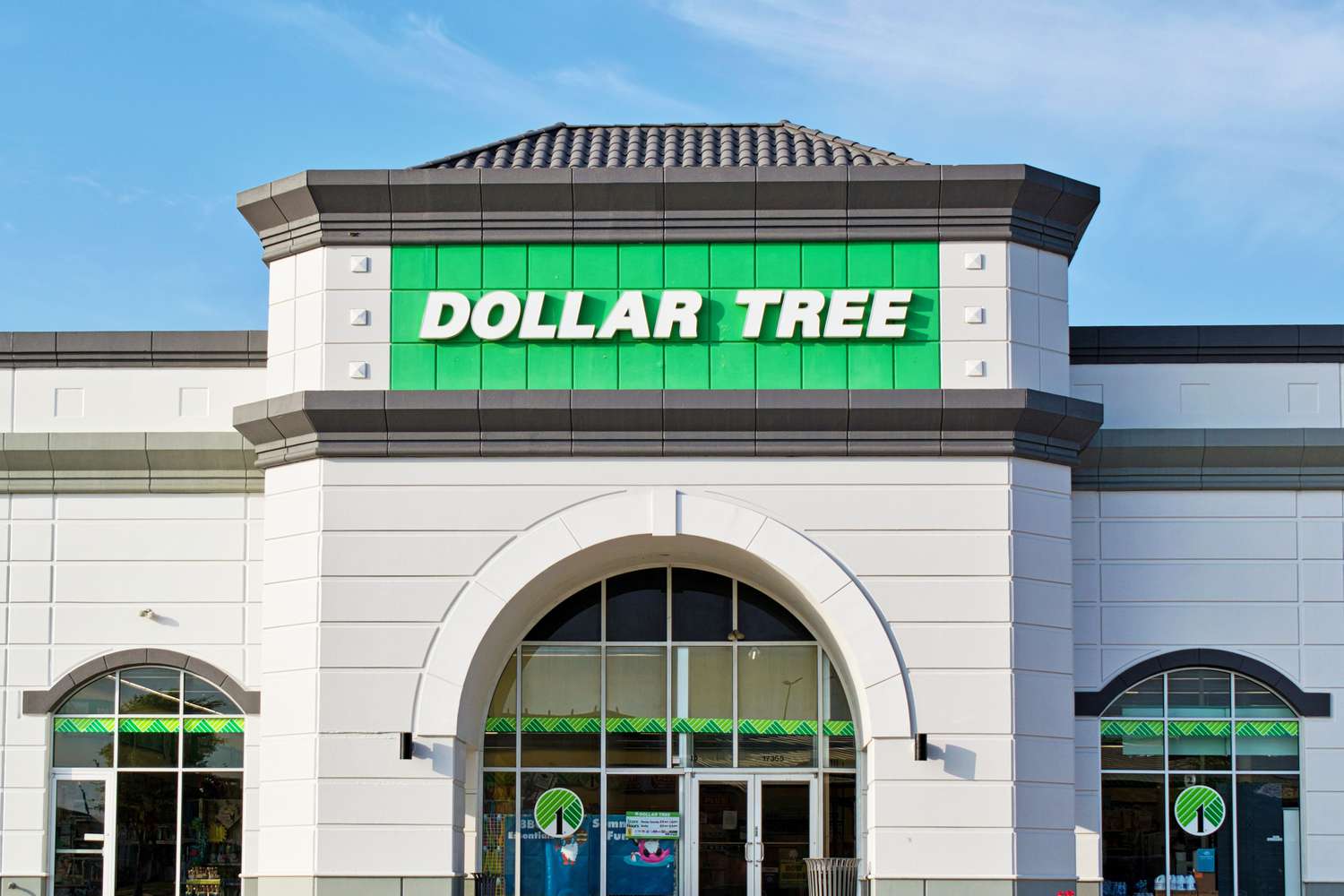 Exterior of a Dollar Tree store with visible signage and building entrance