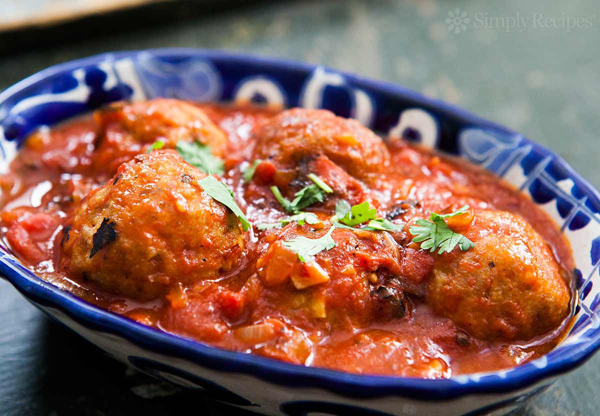 Chipotle Meatballs in Sauce and Topped With Cilantro in a Blue Dish 