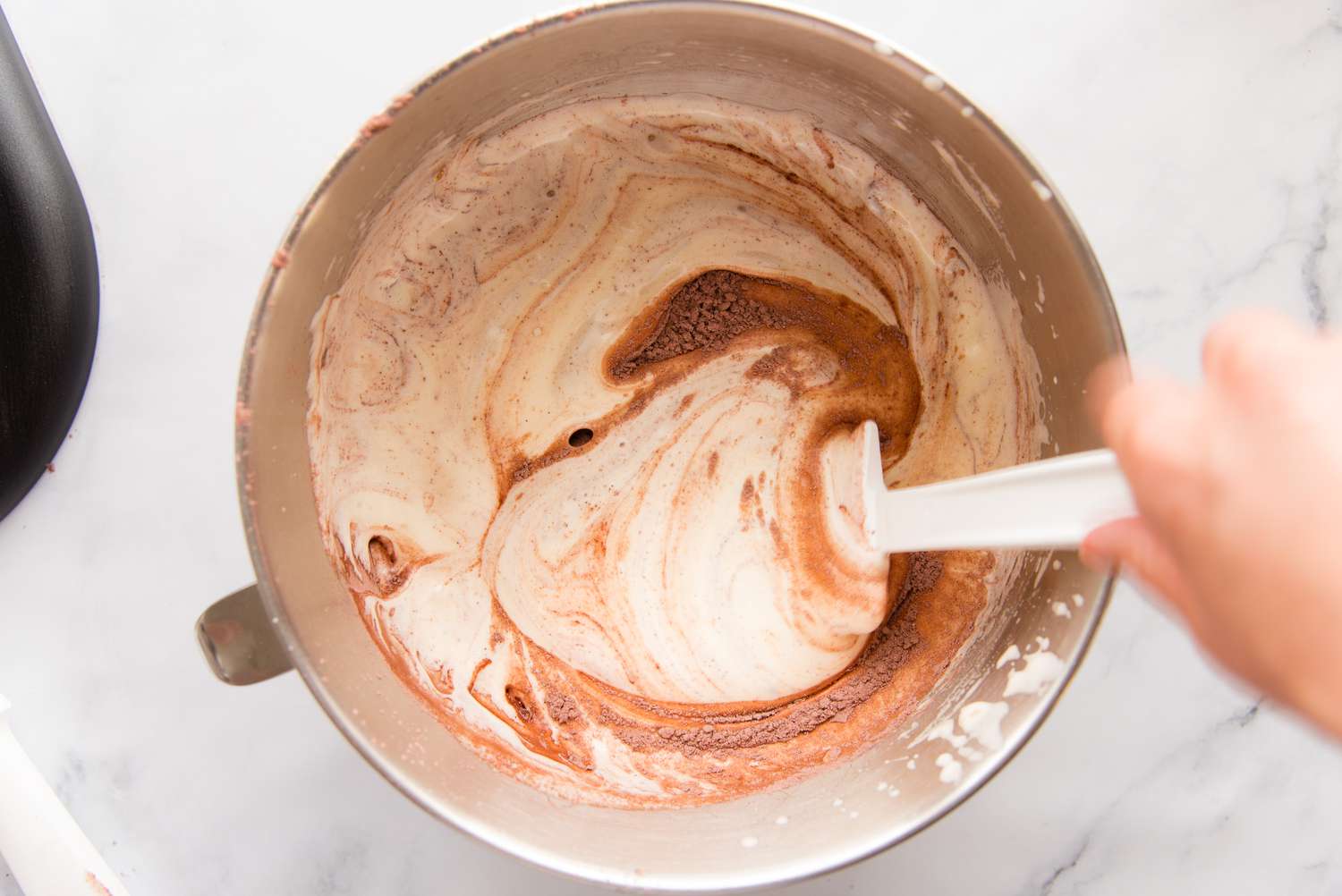 Mixing batter to make the best swiss roll cake recipe.