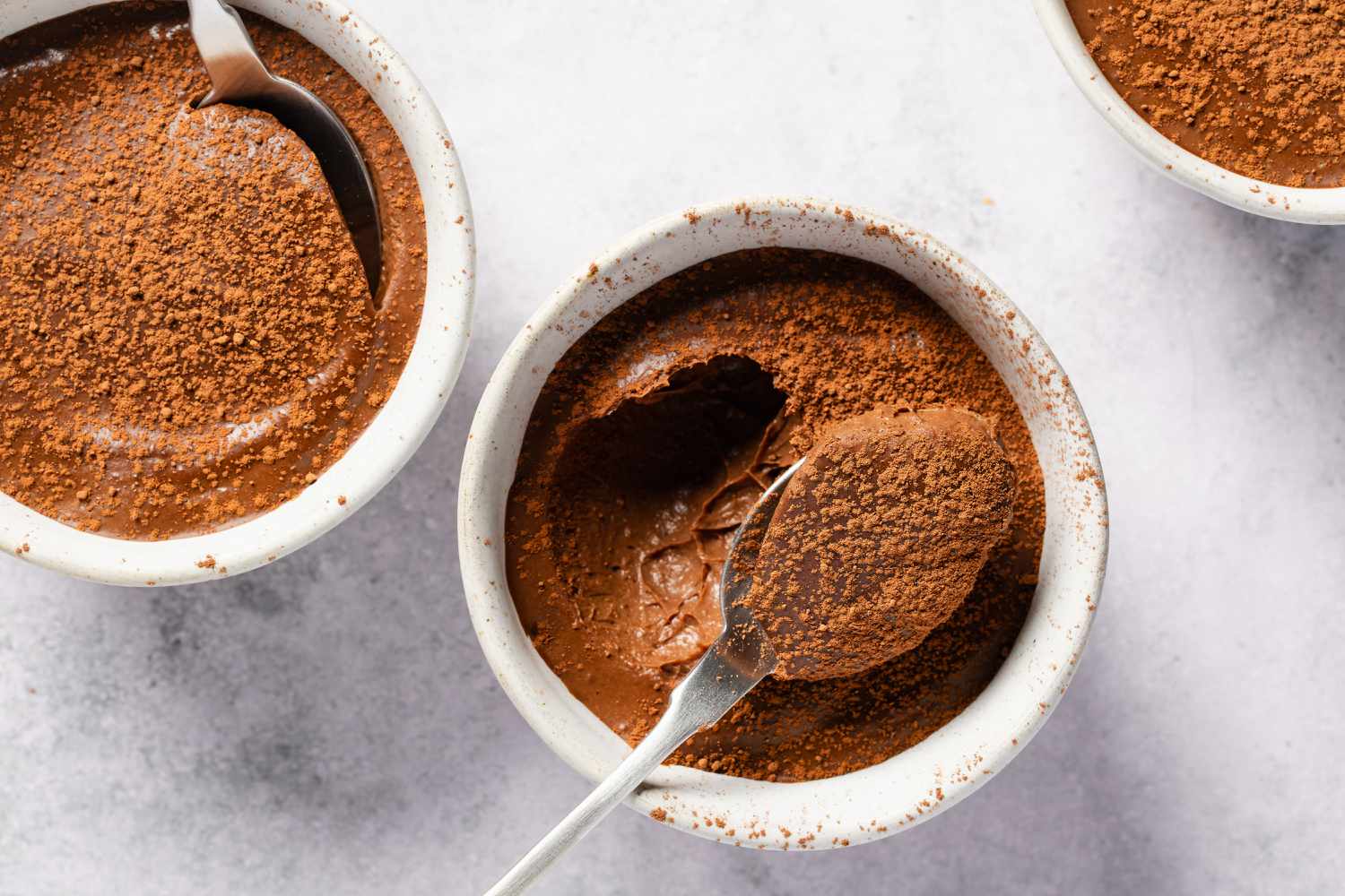 bowl of 2-Ingredient Chocolate Mousse with a spoon full of the mousse hovering above it