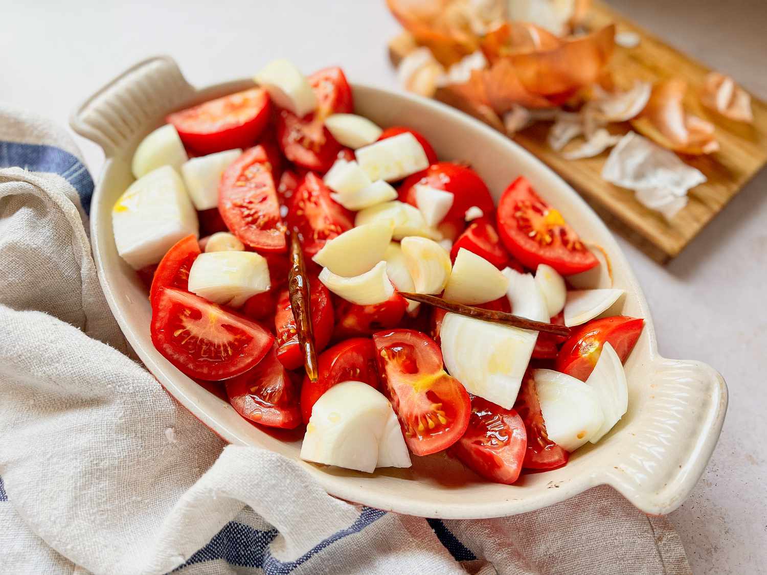 Tomatoes, Onions, and Chiles in a Casserole Dish for Pulled Pork Enchiladas (Not Roasted)