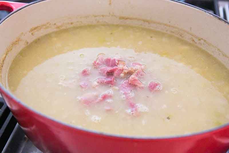 Ham bits surfacing at the top of ham bone potato soup