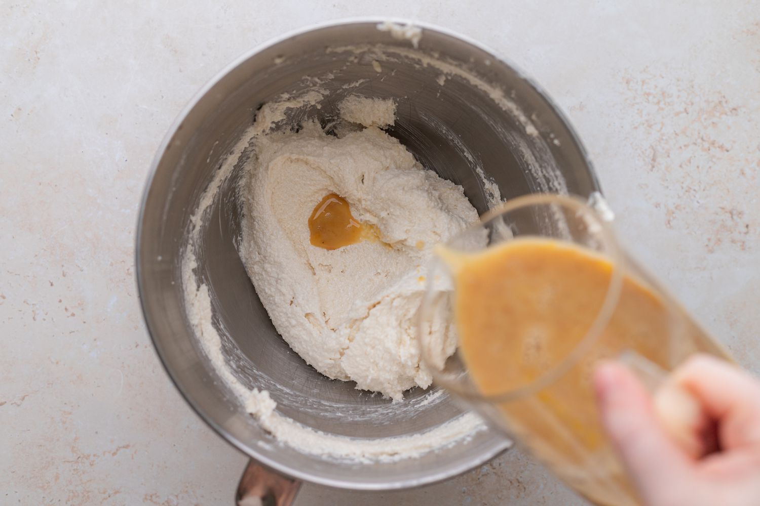 Liquid Ingredients Added to Whipped Butter and Sugar for Layer Cake