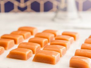 Homemade Caramel Candy cut into squares.