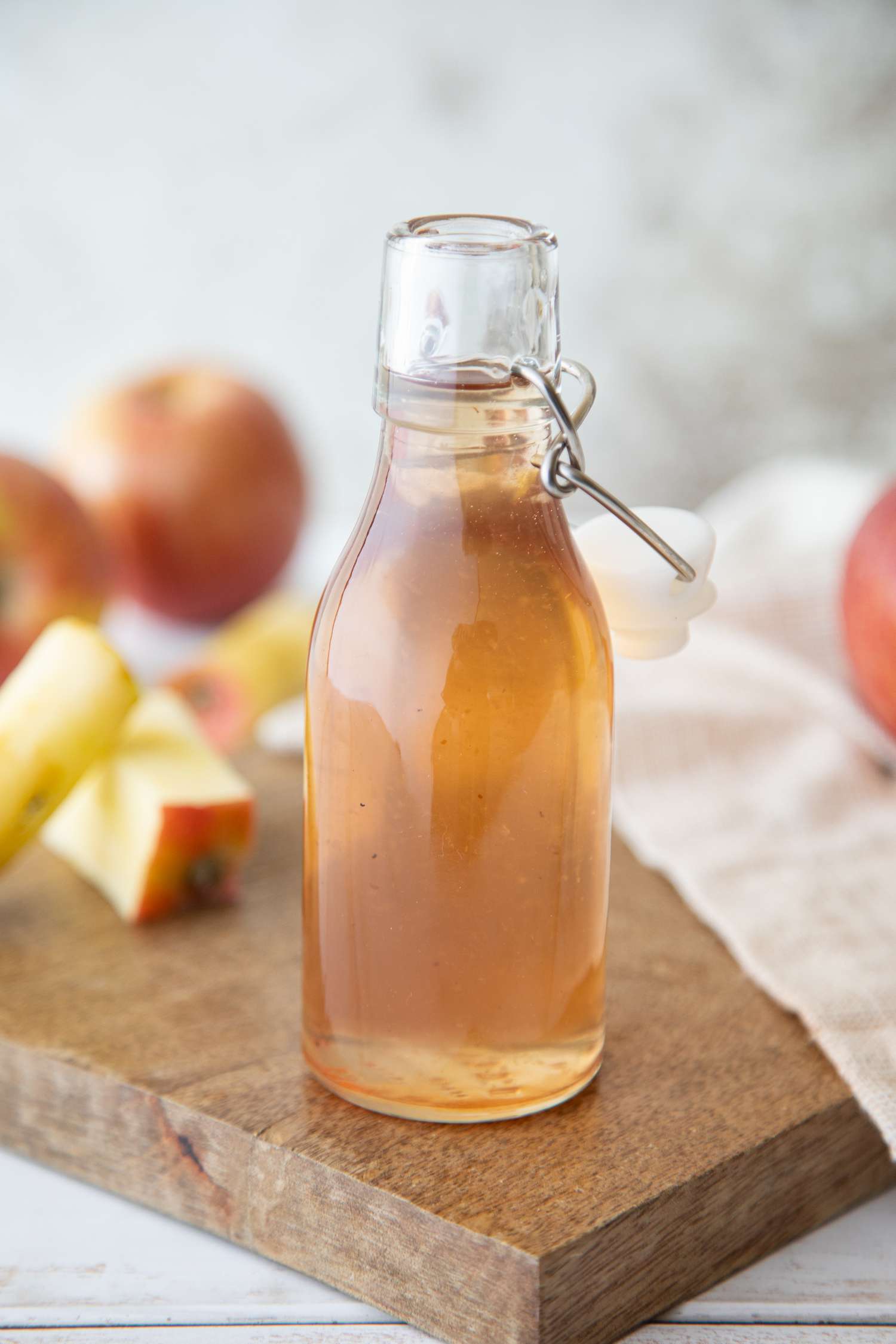 Spiced apple core simple syrup in swing top bottle