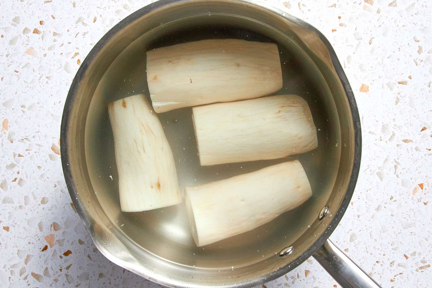Yuca Boiled in a Pot of Water for Yuca Fries Recipe With Spicy Mayo