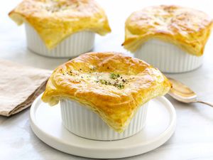 Vegetarian pot pie on white plate.