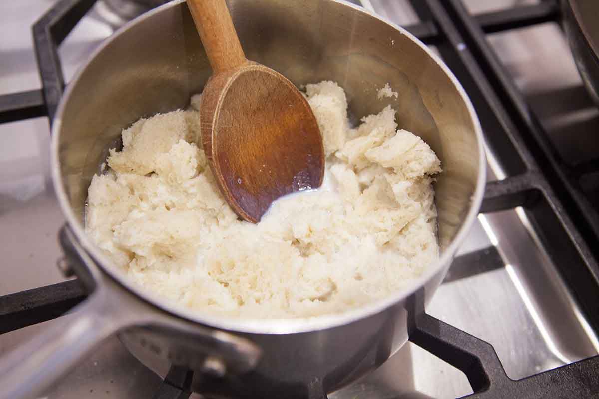 Submerge the bread in hot milk and let it soak