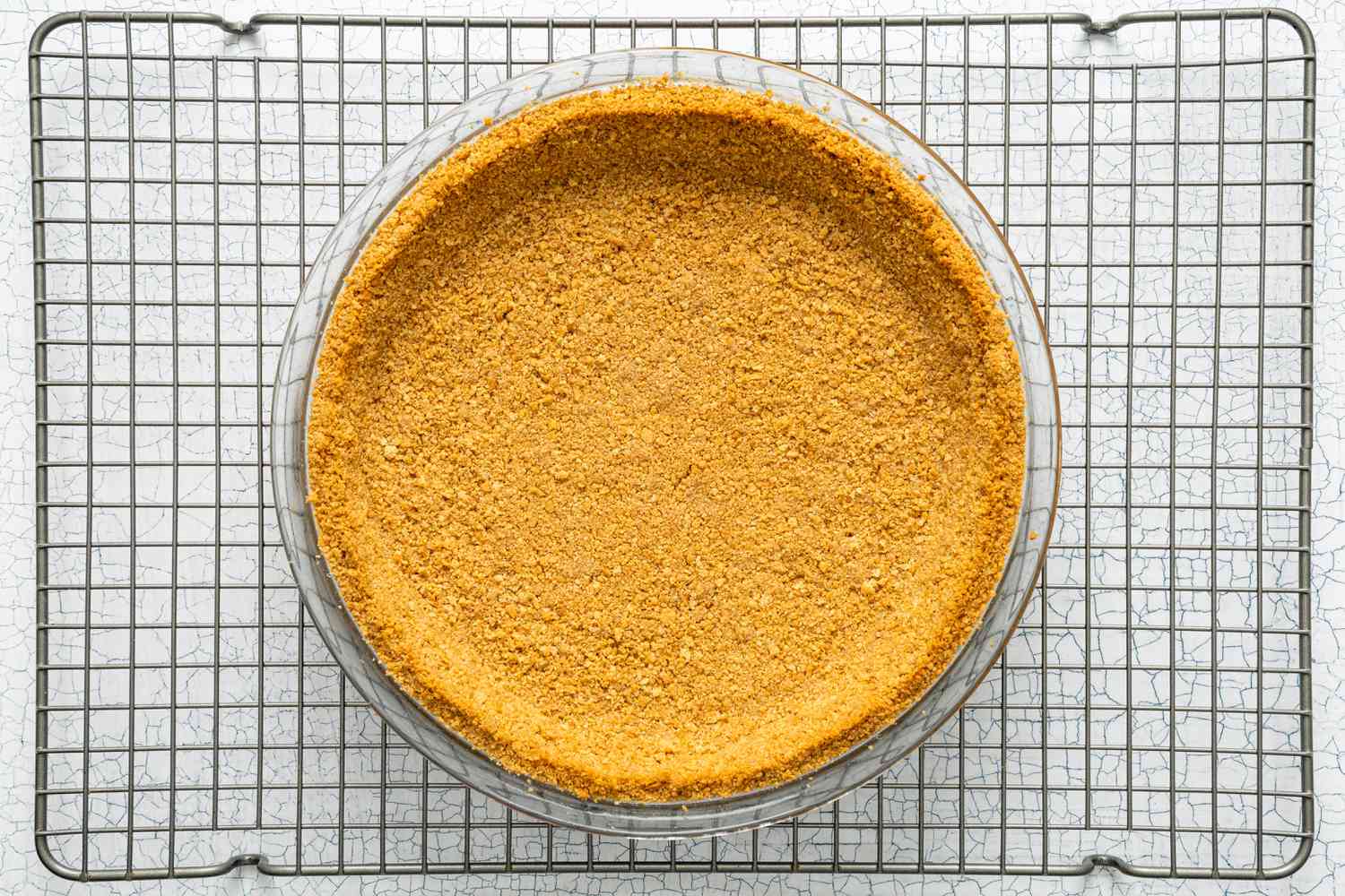Baked Pie Crust Cooling on a Wire Rack for Banoffee Pie Recipe