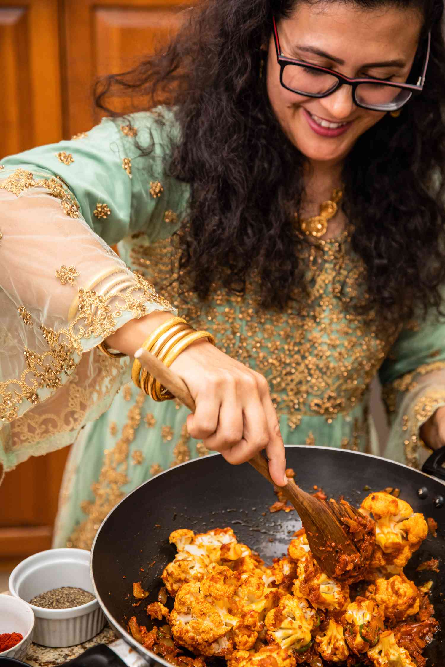Khadija cooking gholpi in an Afghan.