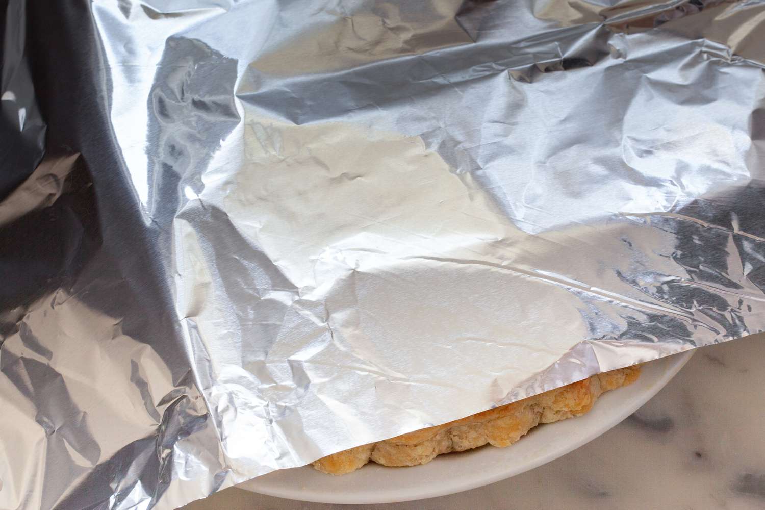 Blackberry Pie Covered in Aluminum Foil