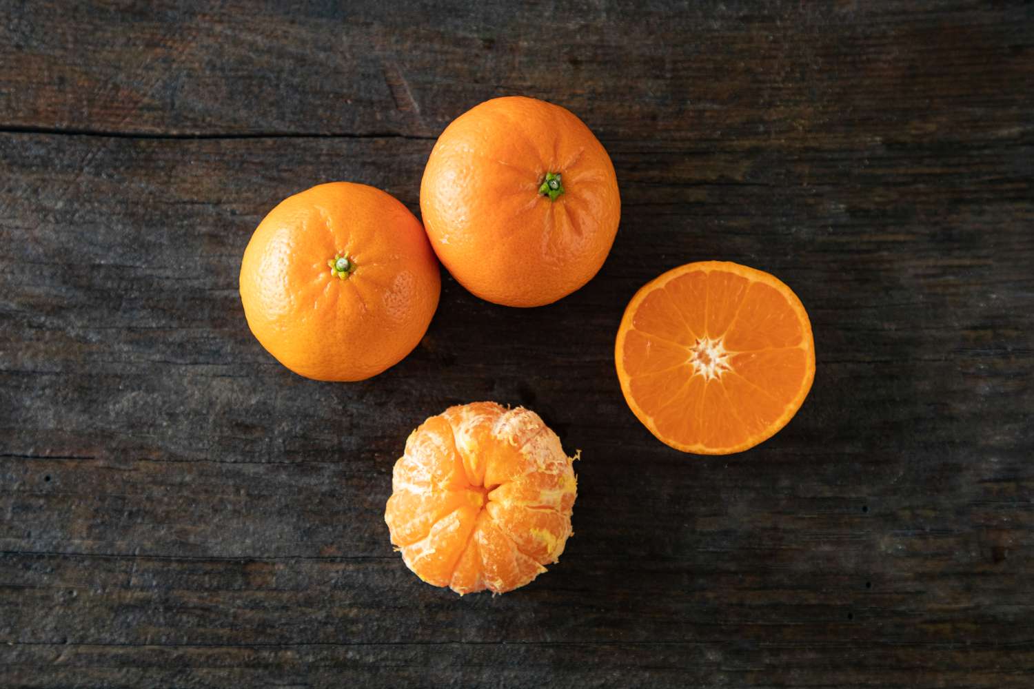 Clementines on dark background