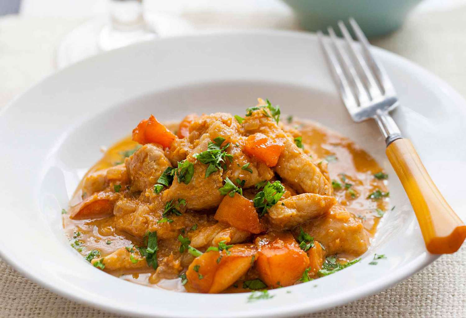 Apricot Chicken in Bowl With Fork