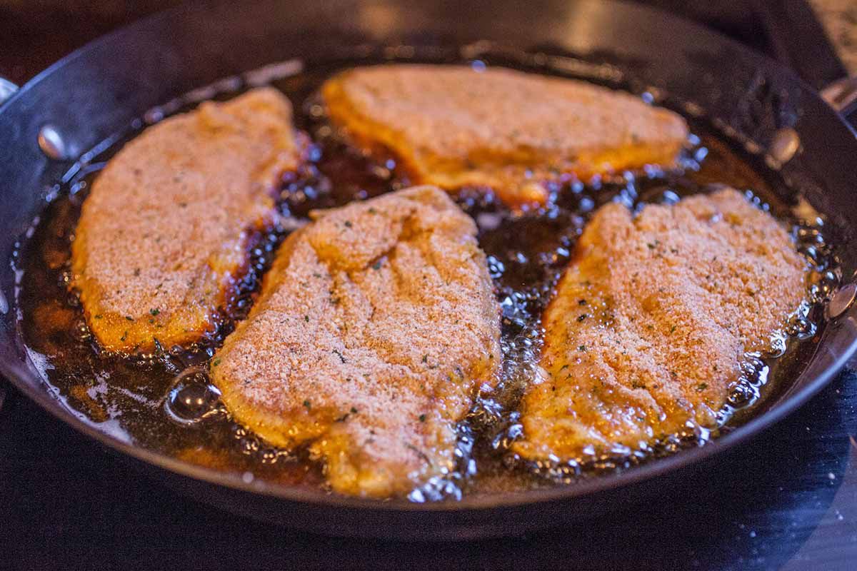 Baked Chicken Parmesan in a Skillet fry the chicken
