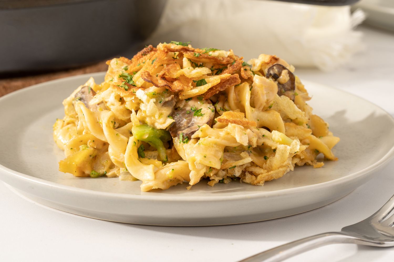 Sideview of a plate with a serving of tuna noodle casserole