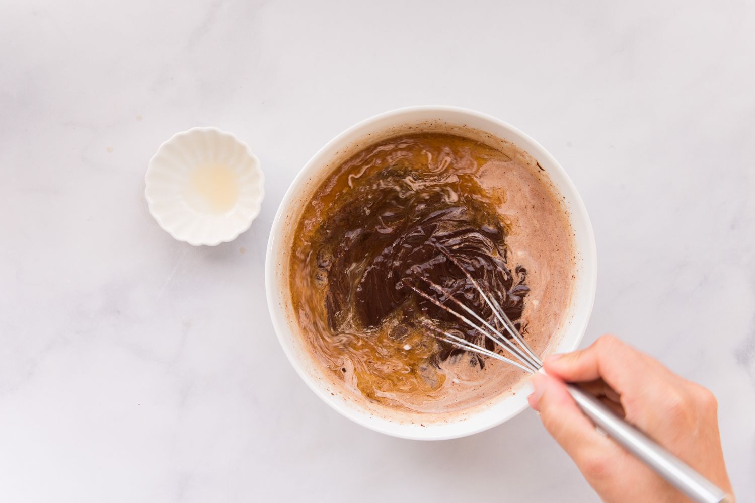 Combining ingredients to make a perfect chocolate ganache recipe