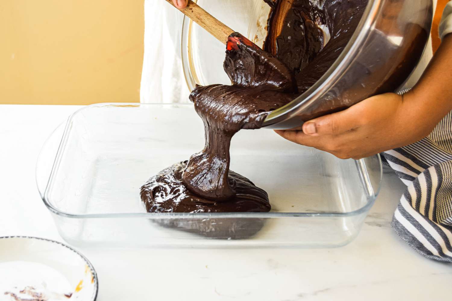 Chocolate Mayonnaise Sheet Cake Batter Poured into a Baking Pan 