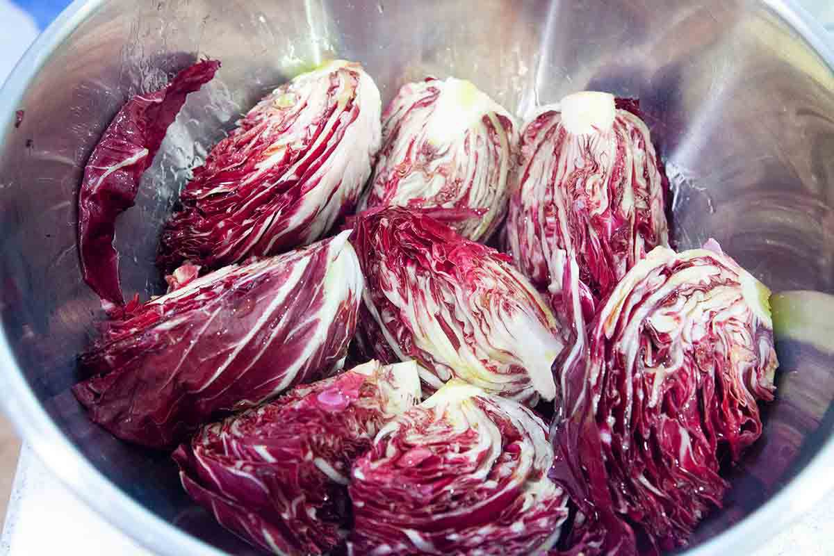 radicchio tossed with olive oil in bowl