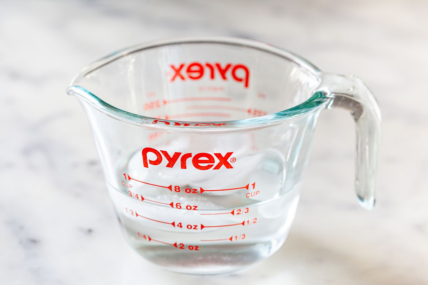 Measuring Cup of Vinegar for Quick Pickled Radishes