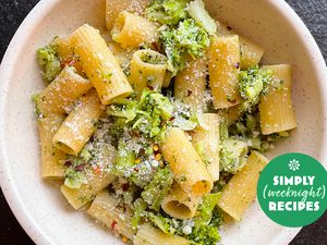 A bowl of pasta with broccoli and a green Simply Recipes tag