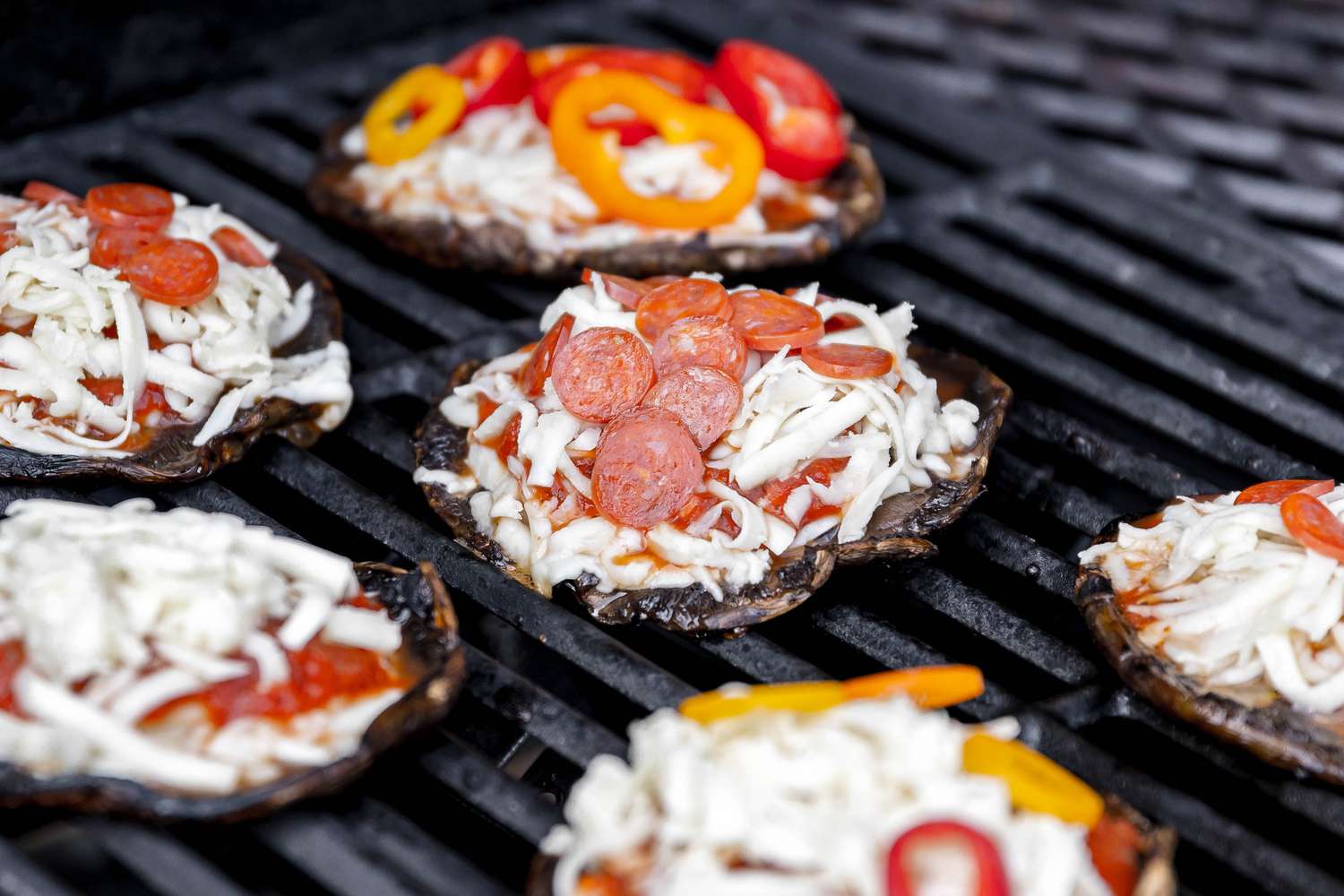 Pizza Sauce, Cheese, and Mini Pepperonis Added to Grilled Mushrooms for Grilled Mushroom Pizza Recipe