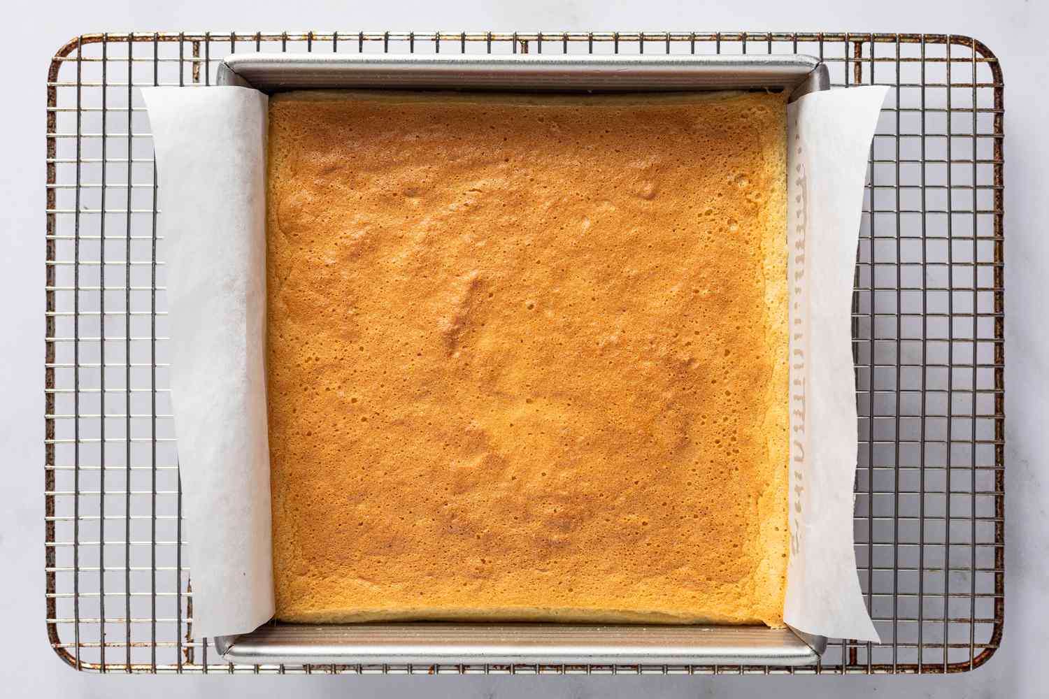 baked magic cake (gÃ¢teau magique) recipe cooling on a wire rack