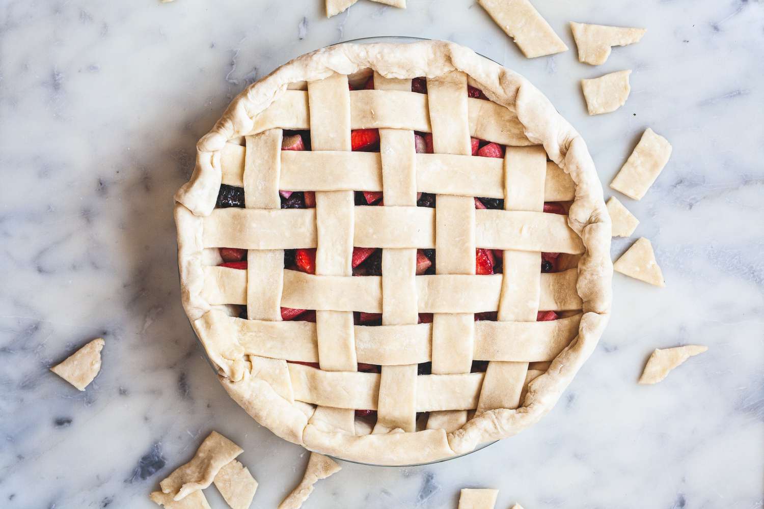 Trimming lattice pie crust.