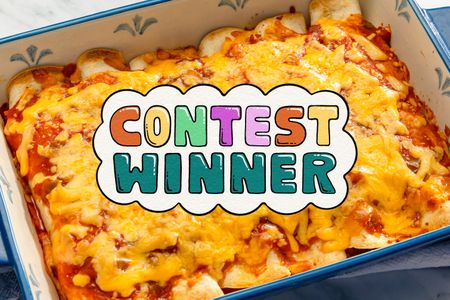 A dish of cheesy tortilla bake with a text graphic overlay reading Contest Winner in colorful letters