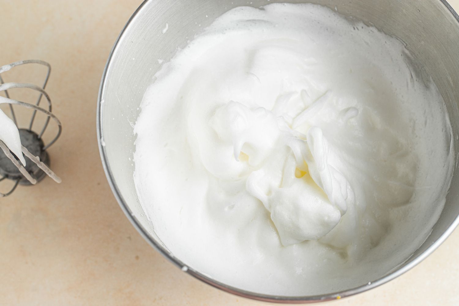 Egg Whites Whipped in a Mixing Bowl for Tres Leches Cake