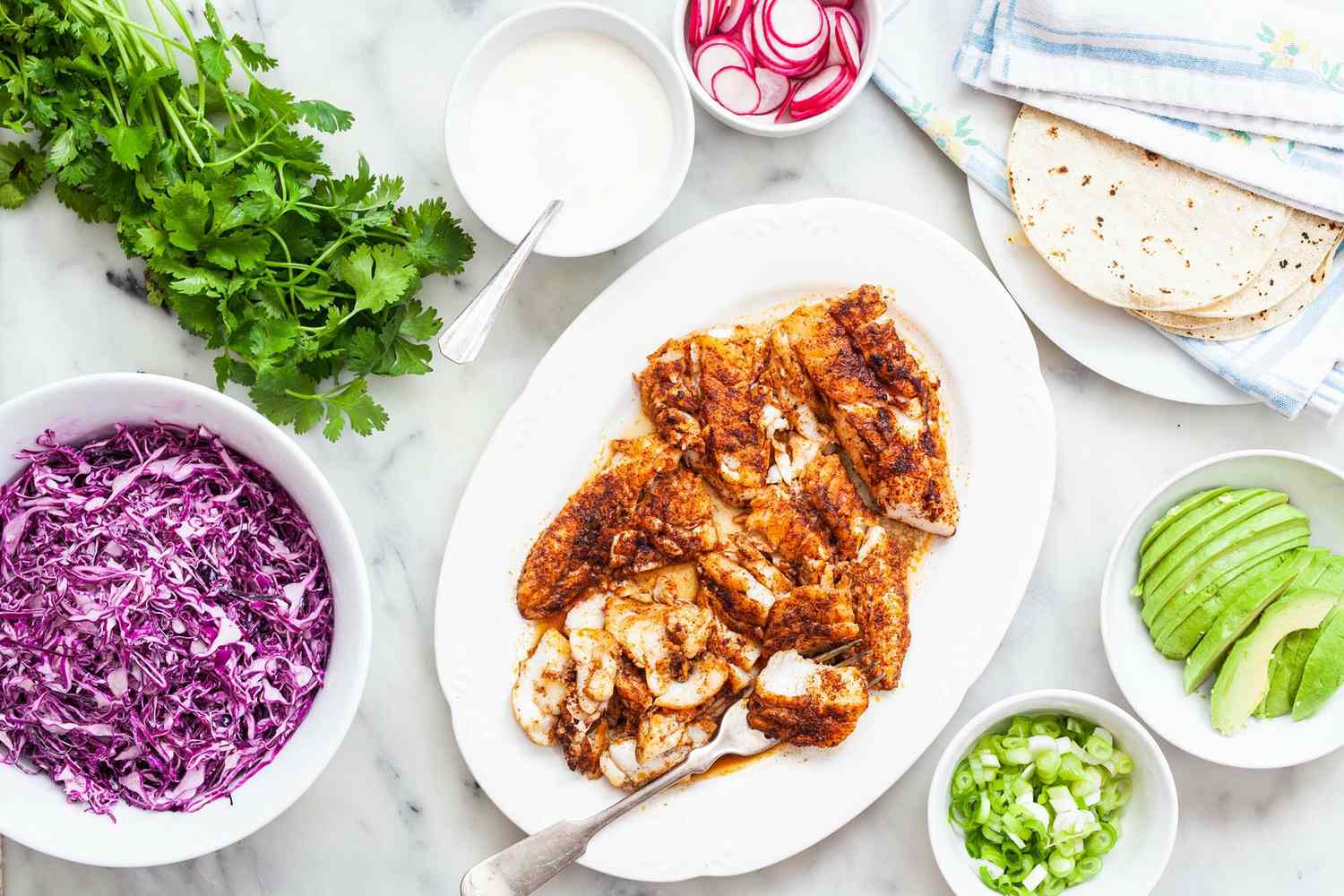 Ingredients for fish tacos gathered 