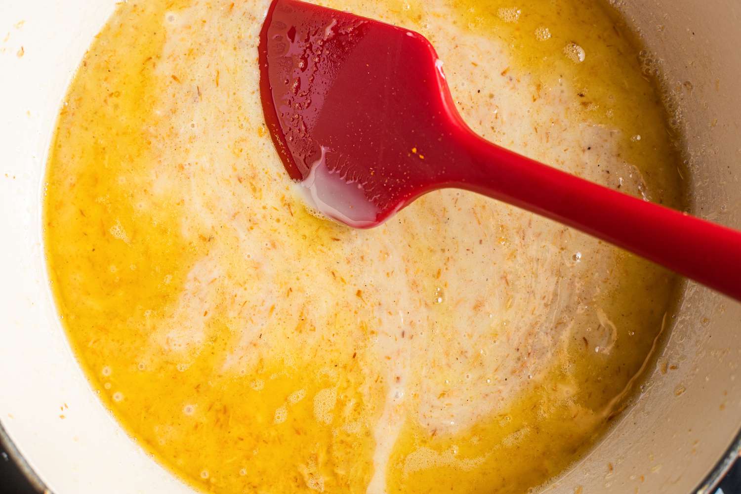 Condensed Milk and Seasoning Added to Skillet