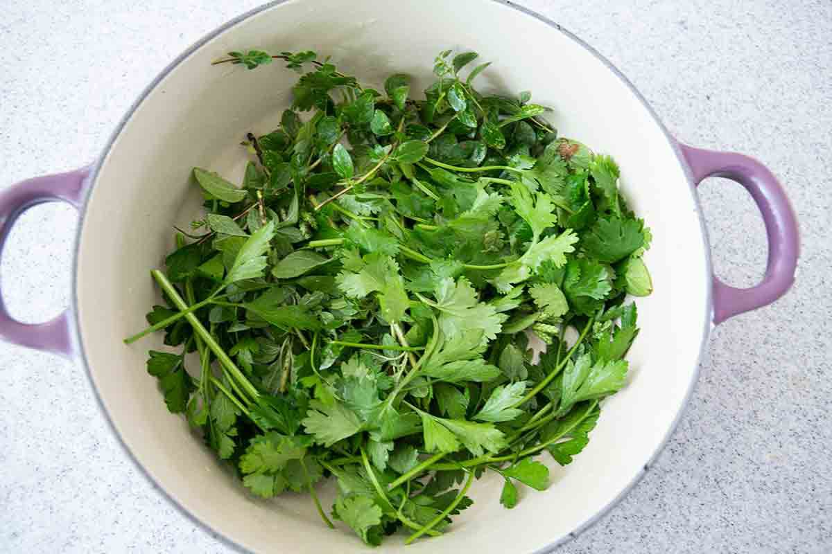 bed of herbs in pot for octopus salad