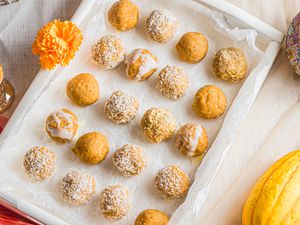 Pumpkin Ladoo on a Tray with Flowers