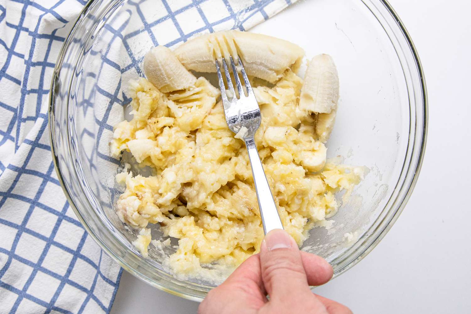 Fork Used to Mash Overripe Bananas for 3-Ingredient Banana Pancakes Recipe