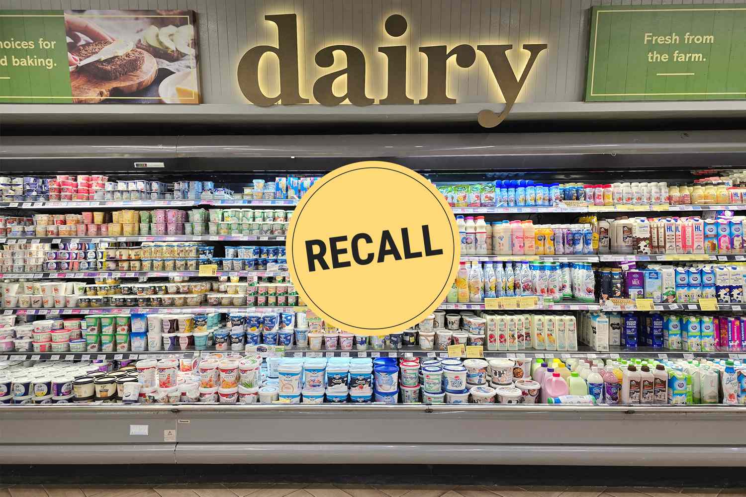 Supermarket dairy section with a recall notice displayed
