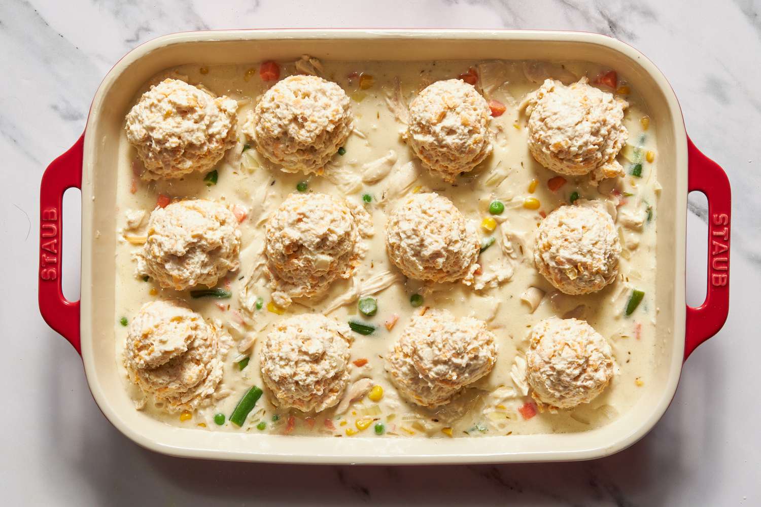 Chicken cobbler recipe topped with cheddar bay biscuit top 