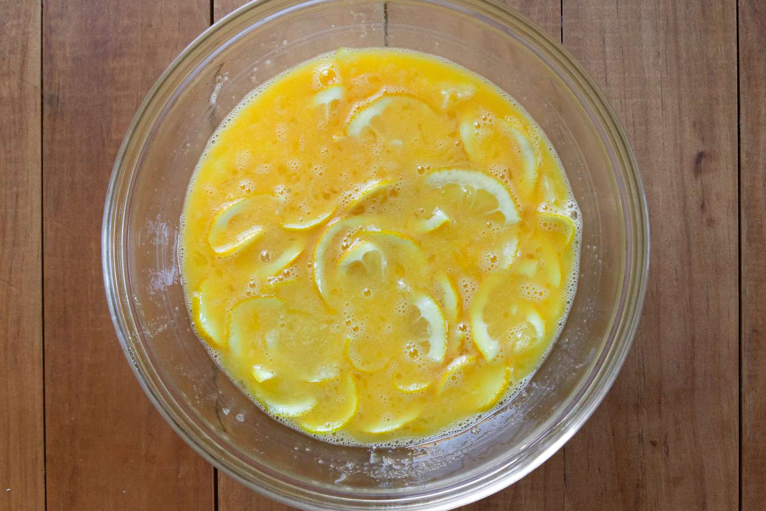 Filling in a bowl to make a Shaker Lemon Pie.