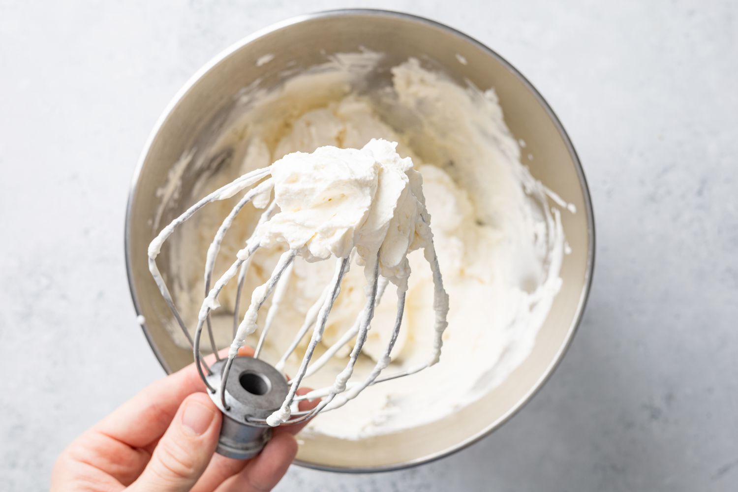 Whipped Cream for Piña Colada Pie on a Whisk Attachment and More in a Mixer Bowl 