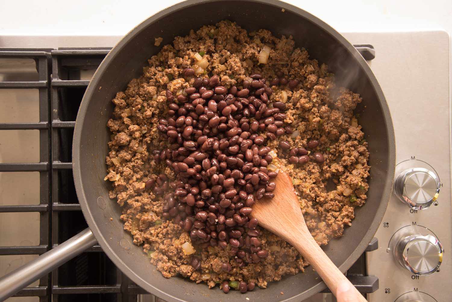 Black Beans Added to Ground Beef for Beef Enchilada Casserole 