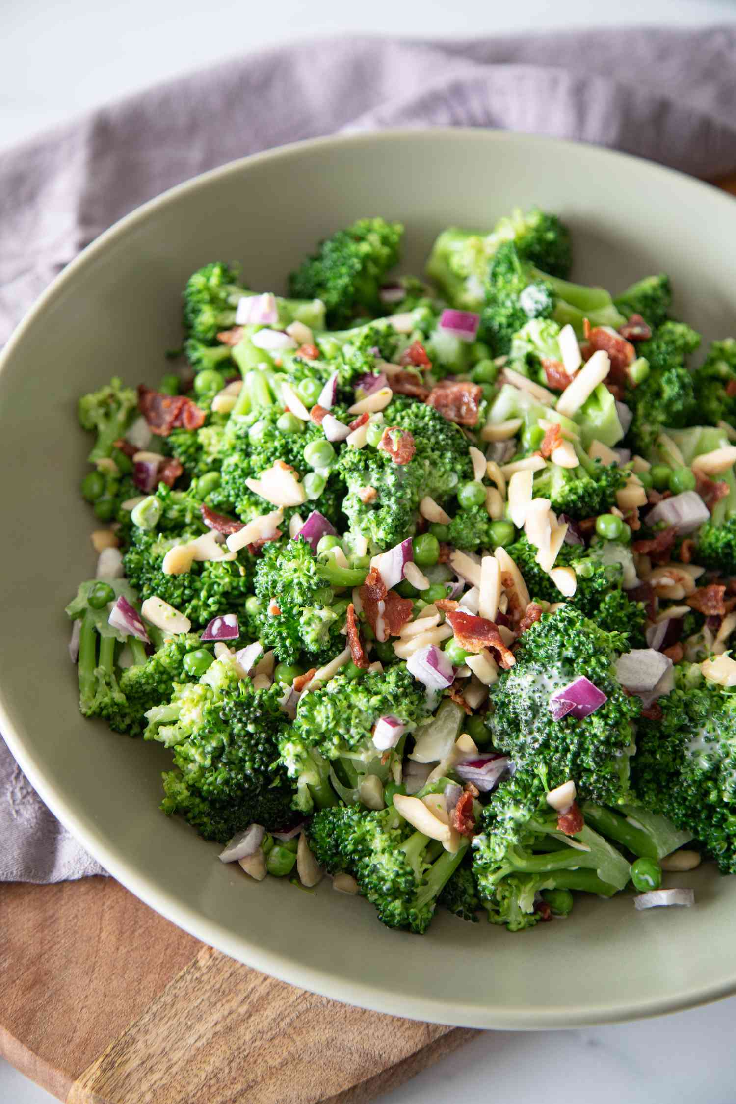 A giant bowl full of Broccoli Salad with bacon