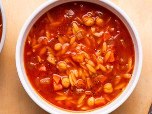 overhead view of a bowl of 20-Minute Tomato Orzo Soup