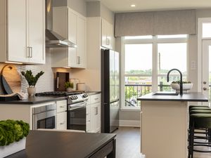 A clean, modern-looking kitchen with lots of natural light
