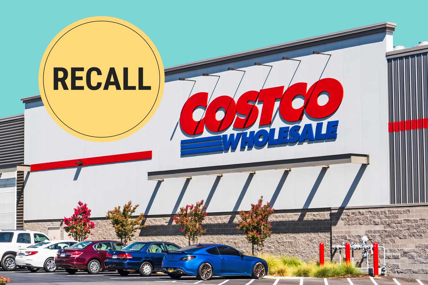 Costco storefront with a recall announcement badge above it parked cars in the foreground